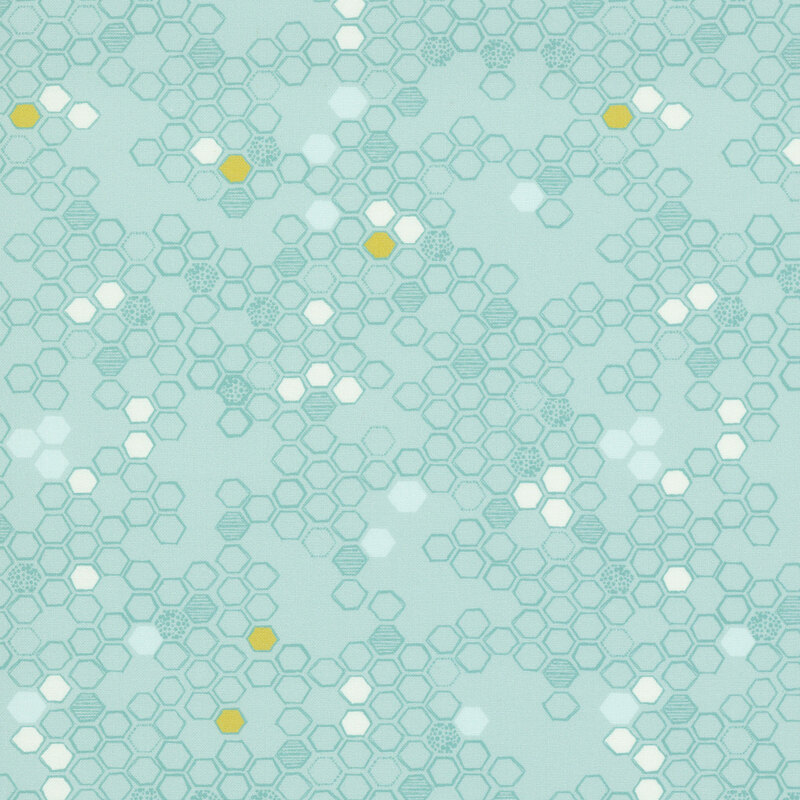 This robin's egg fabric features a hand drawn design of tonal hexagons. 