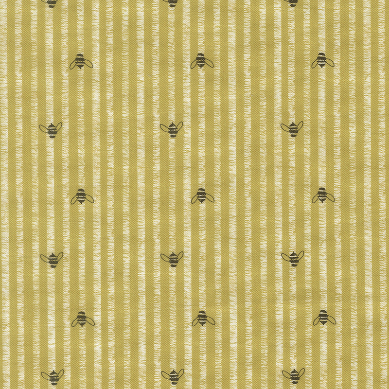 This butter yellow fabric features rustic white stripes accented with charming hand drawn bees.