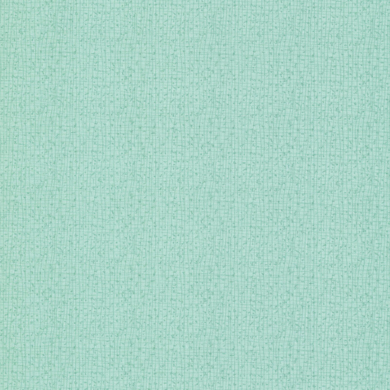 A close-up of a textured robins's egg fabric with small, subtle weaves.