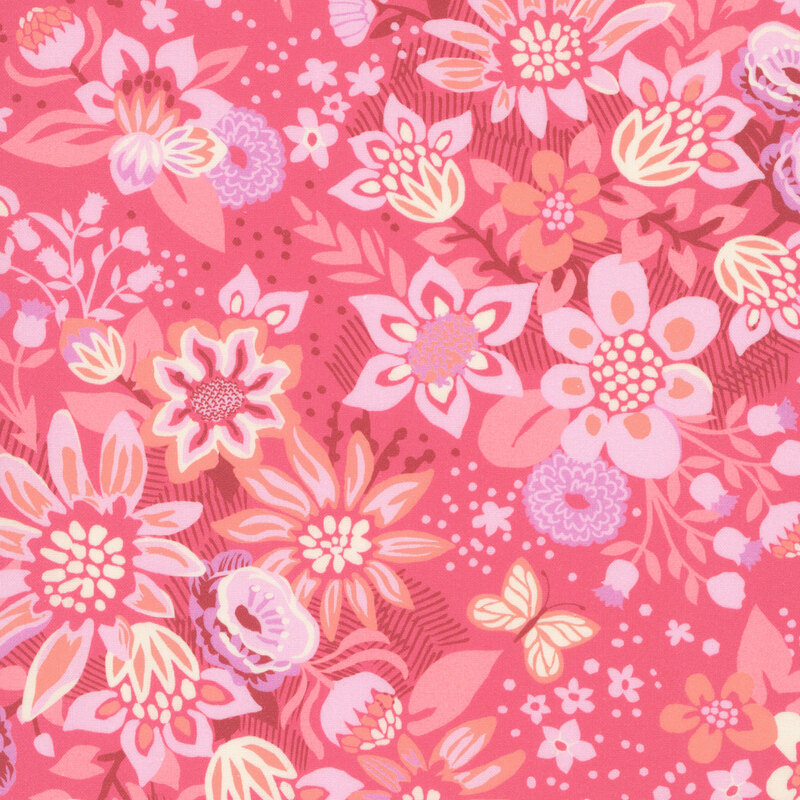 This coral pink fabric features abstract pink and orange florals. 