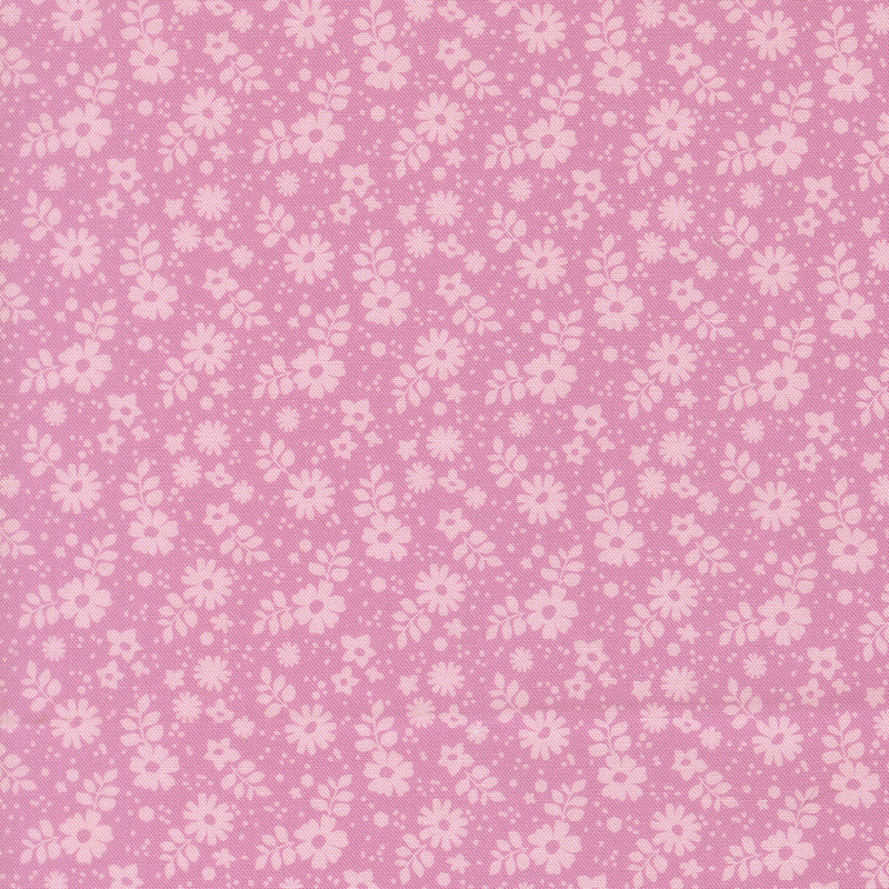 This tonal bubblegum fabric features tossed florals.