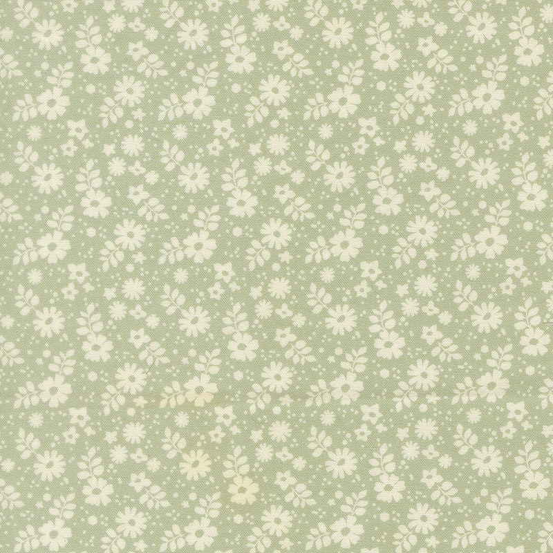 This mint green fabric features tossed cream florals.