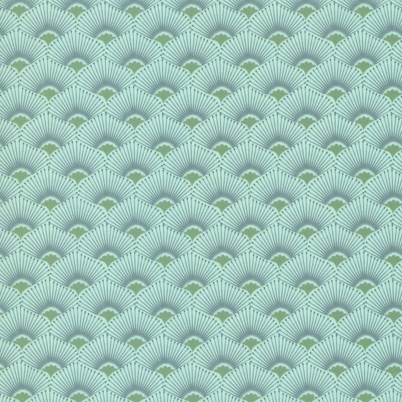This light teal fabric features a scalloped design highlighted by radiant sage green centers and muted blue rays. 