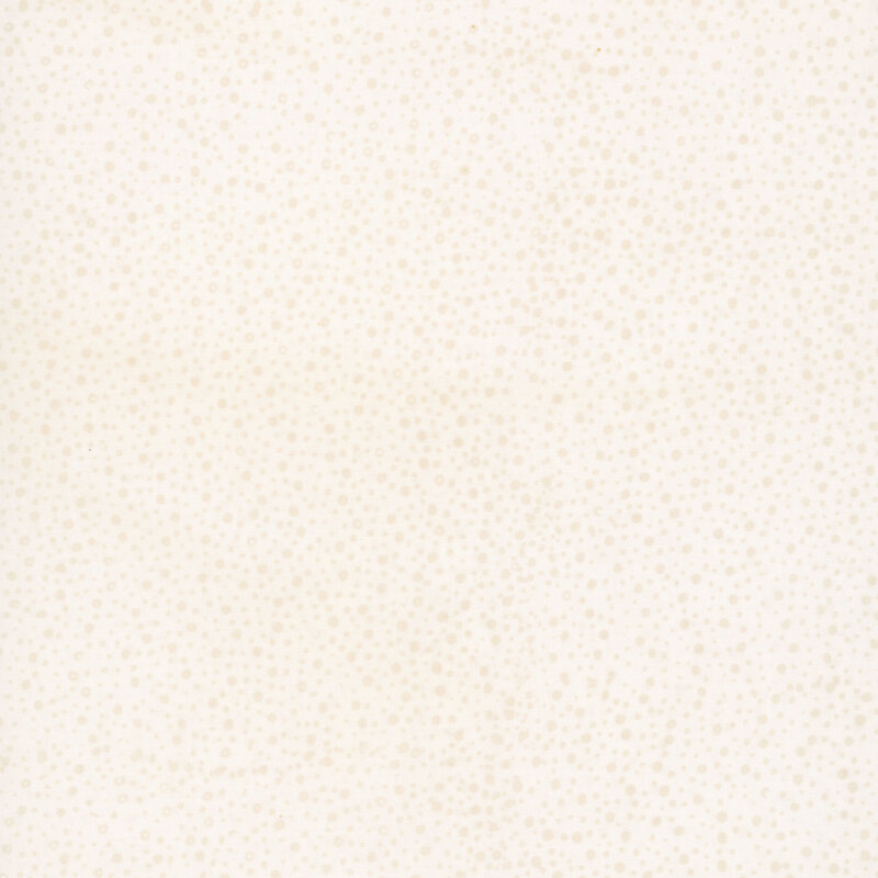 white fabric with a pattern of tonal dots on a mottled background.