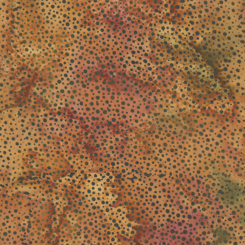 copper fabric with a pattern of green dots on a mottled background.