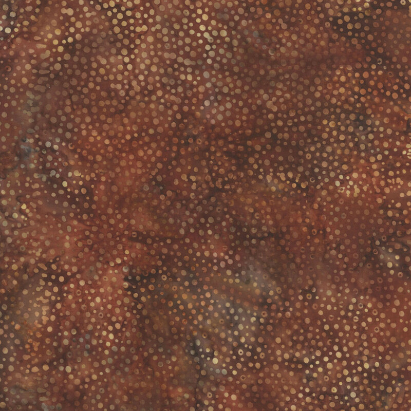 bronze brown fabric with a pattern of dots on a mottled background.