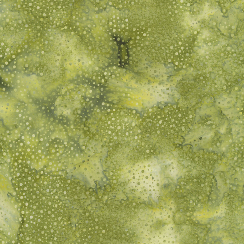green fabric with a pattern of tonal dots on a mottled background.