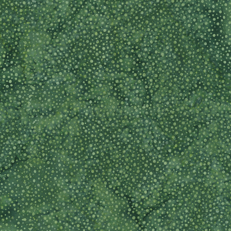 sage green fabric with a pattern of dots on a mottled background.