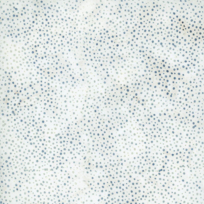 Cool white fabric with a pattern of denim blue and pale sage dots on a mottled background.