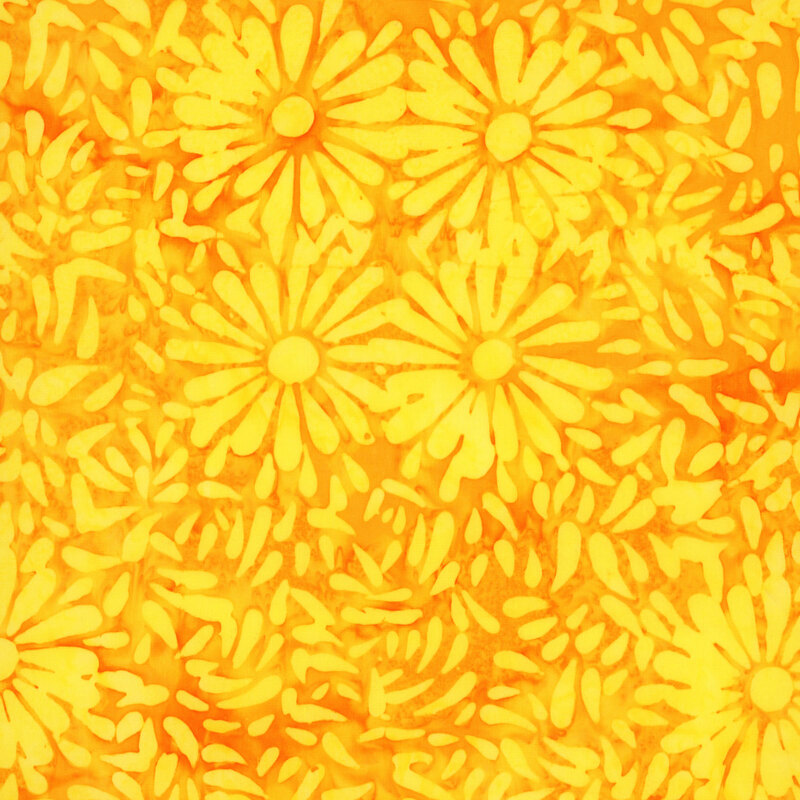 Orange yellow batik featuring a repeating daisy petal motif.