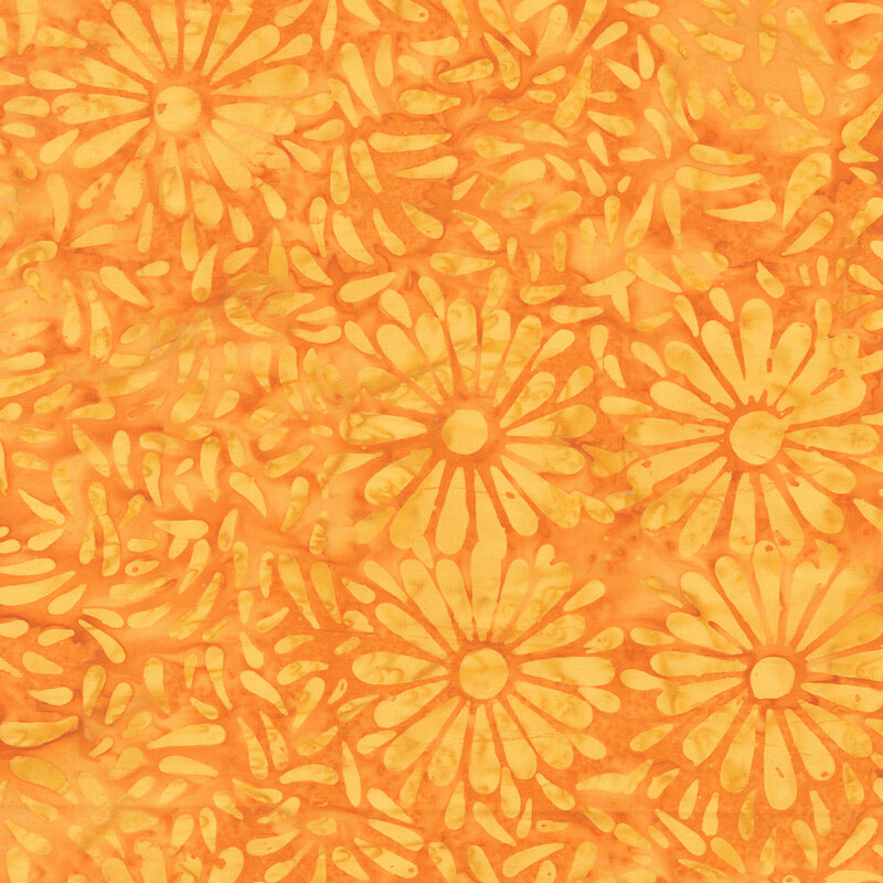 Orange batik featuring a repeating daisy petal motif.