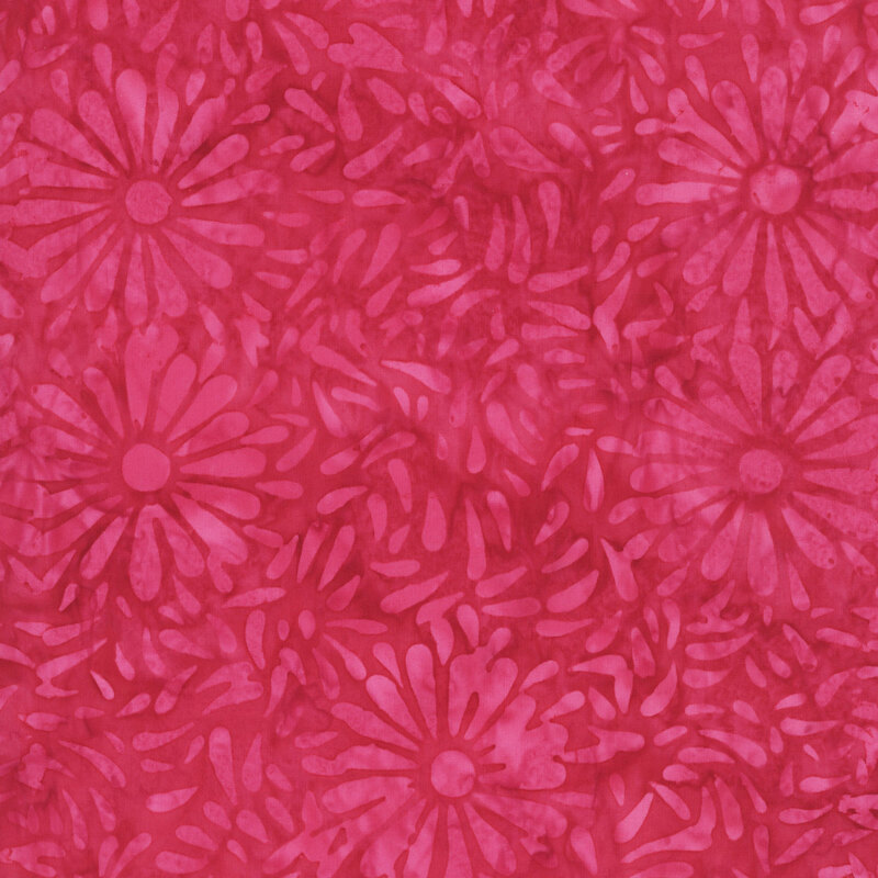 Pink batik featuring a repeating daisy petal motif.
