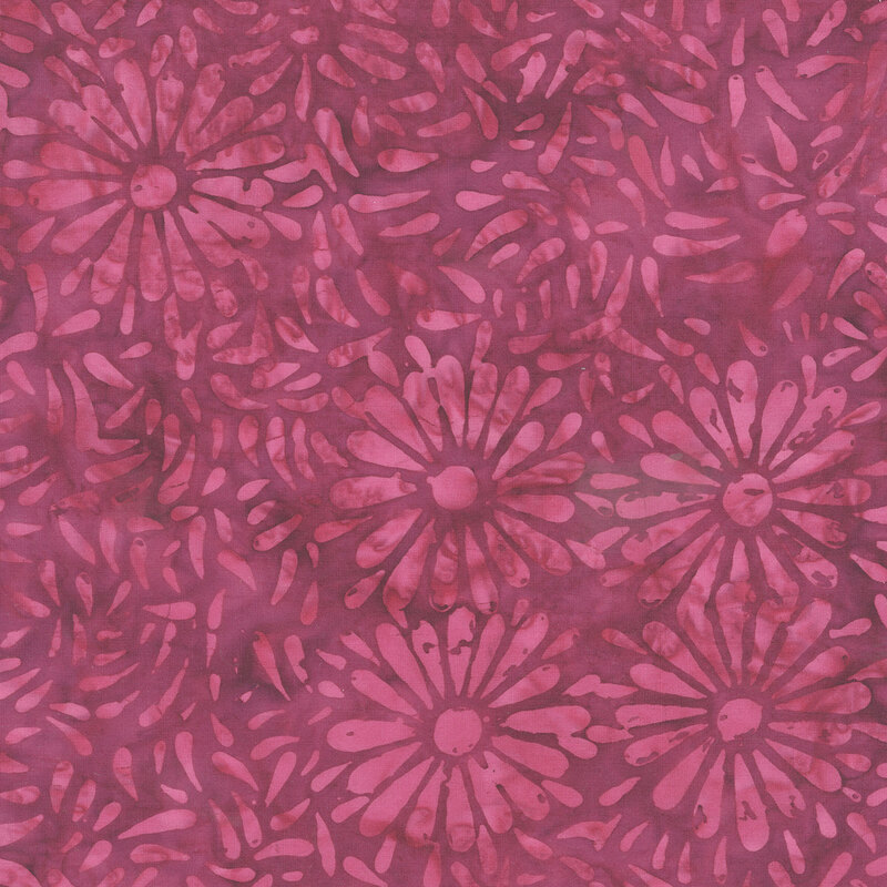 Plum batik featuring a repeating daisy petal motif.