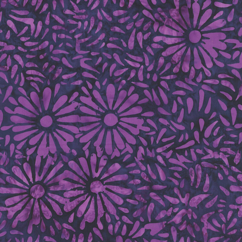 Contrasting purple batik featuring a repeating daisy petal motif.