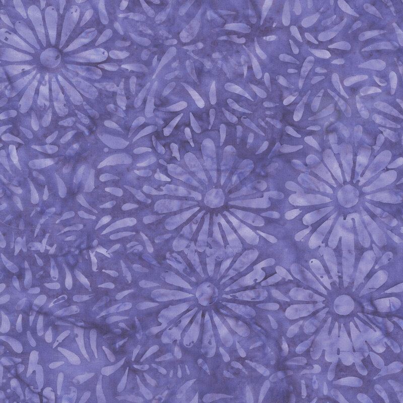 Purple batik featuring a repeating daisy petal motif.