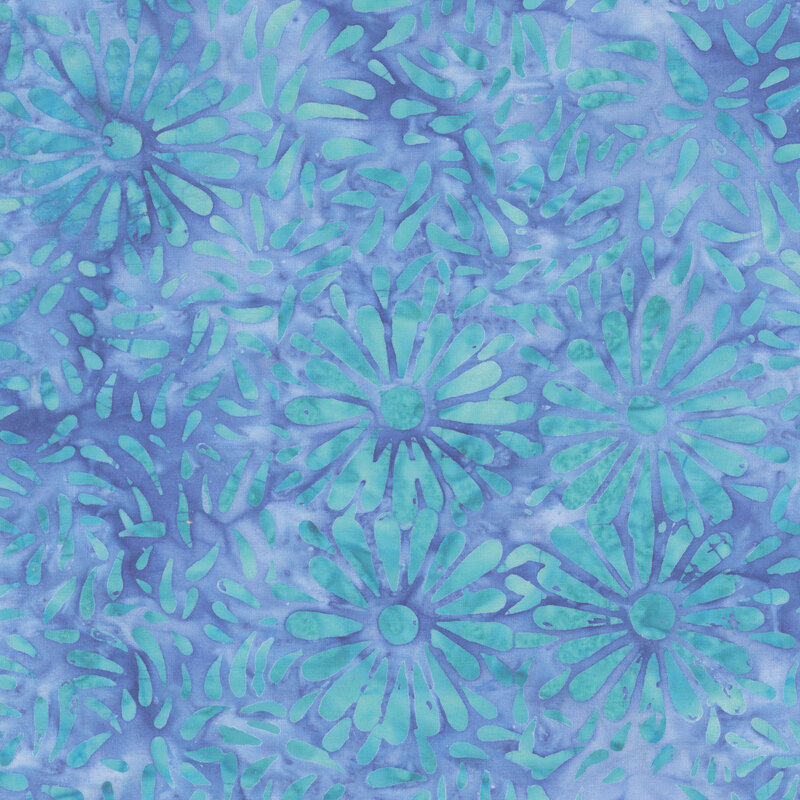 Vibrant blue batik featuring a repeating daisy petal motif.