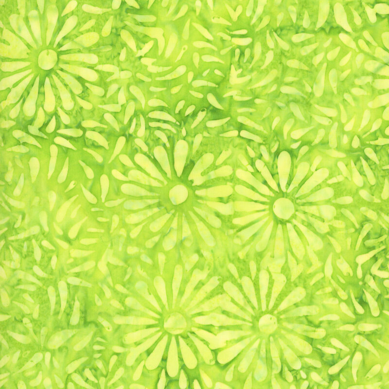 Bright lime batik featuring a repeating daisy petal motif.