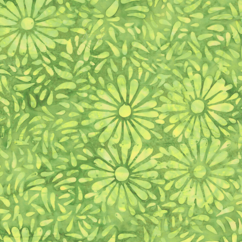 Grass green batik featuring a repeating daisy petal motif.