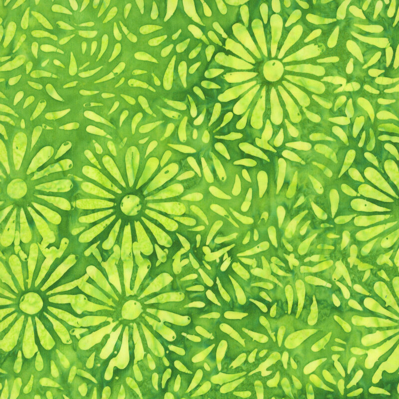 Grass green batik featuring a repeating daisy petal motif.