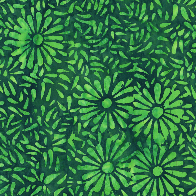 Dark green batik featuring a repeating grass green daisy petal motif.