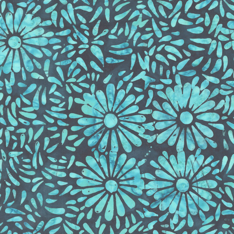 Dark blue batik featuring a repeating baby blue daisy petal motif.