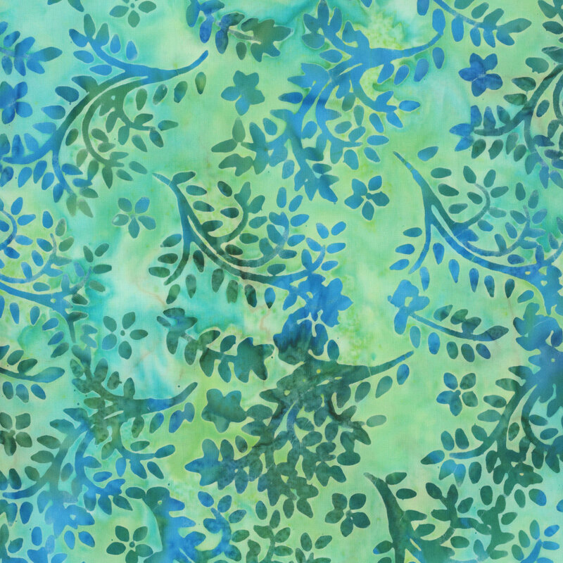 Green and turquoise vine batik wrapped throughout with vines and leaves.