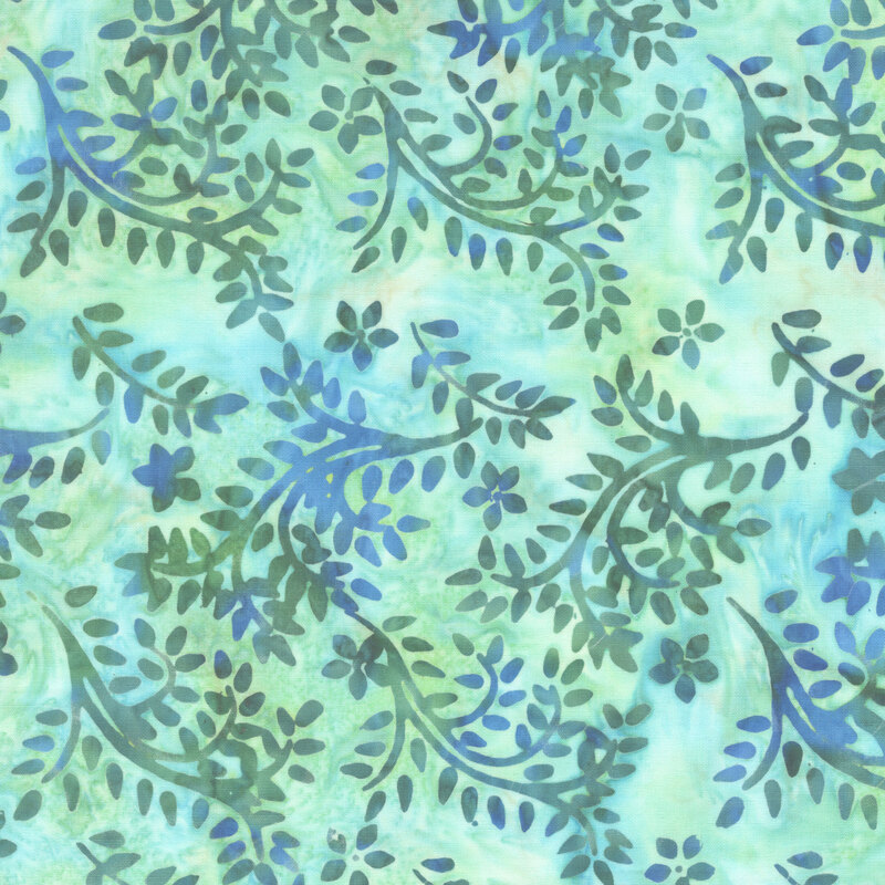 Green and turquoise vine batik wrapped throughout with vines and leaves.