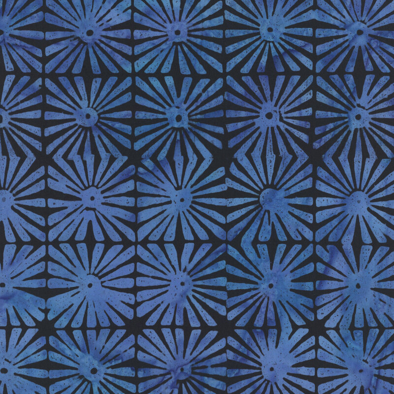 Black geometric batik with a grid pattern of sun rays.