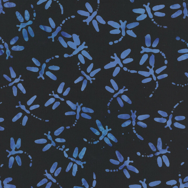 Black batik with peacock blue dragonflies scattered throughout the fabric.