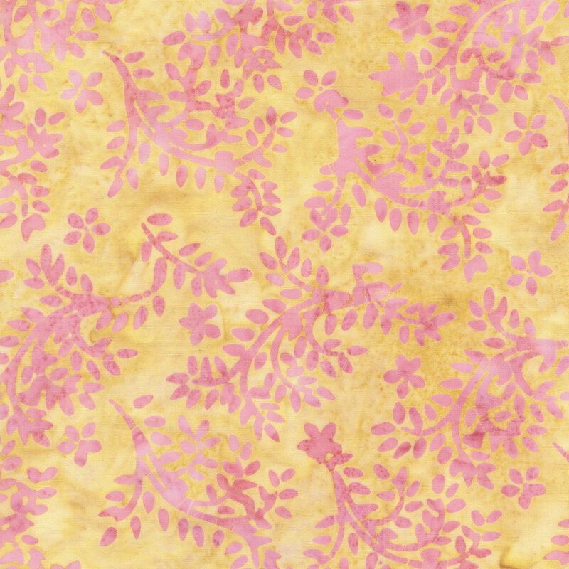 Batik fabric with a light magenta vine and leaf pattern on a mottled mustard background.