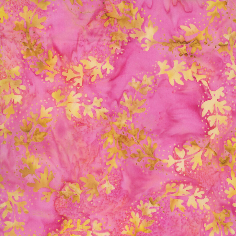 Mottled pink fabric featuring rings of leafy vines with dotted accents in golden yellow hues.