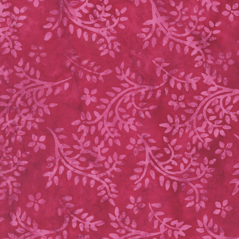 Mottled magenta red fabric featuring a tossed vine and leaf pattern in soft orchid hues.