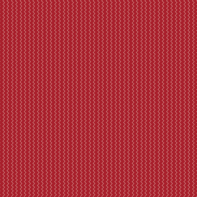Red fabric with a repeating vertical white dotted zigzag pattern.