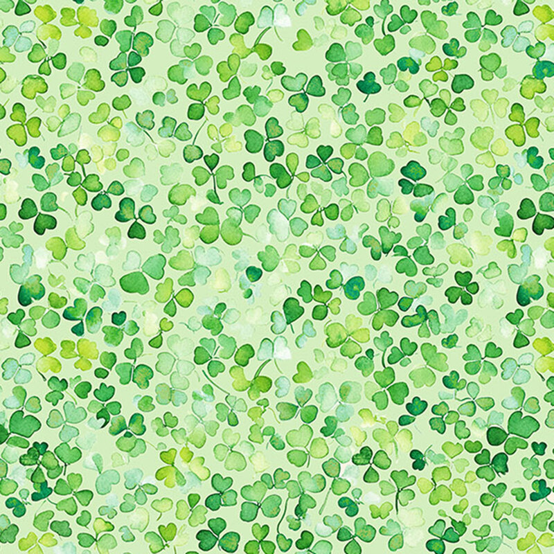 Mint fabric with watercolor green tonal shamrocks scattered across the top.