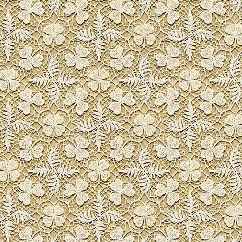 Beige fabric interlaced with cream shamrocks and leaves.