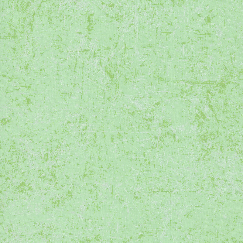 Mint green fabric with a grunge-style texture with pearlized accents.