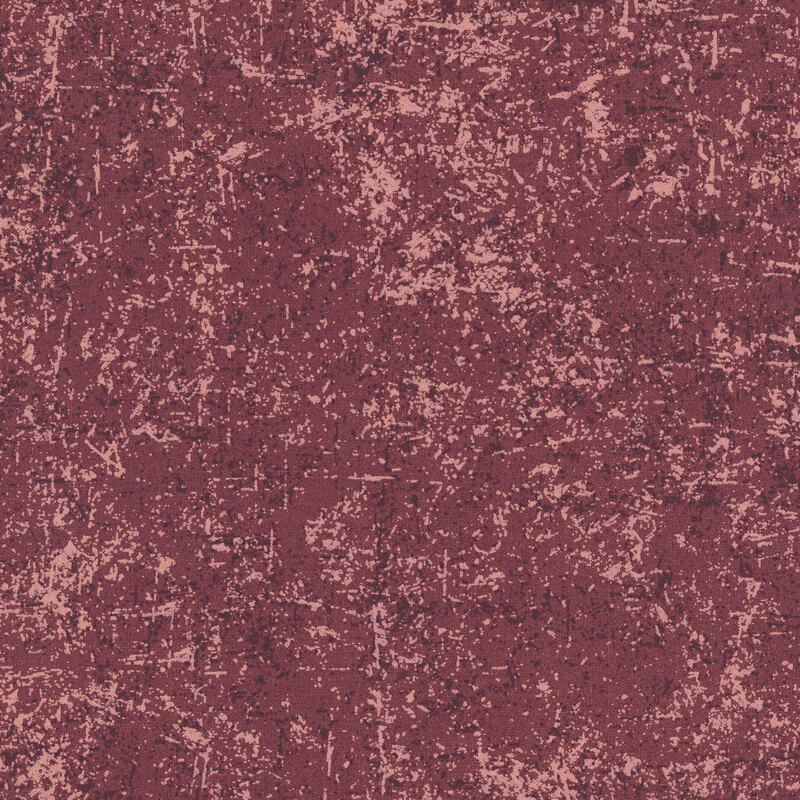 Dark cherry fabric with a grunge-style texture with pearlized accents.