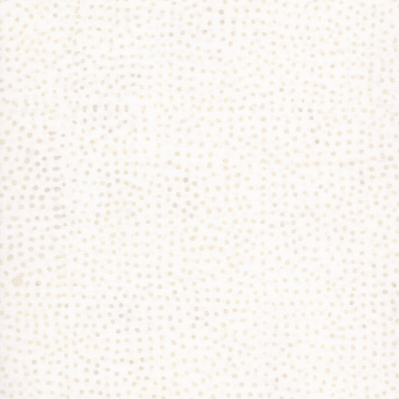 White batik fabric with a scattered pattern of tonal dots.