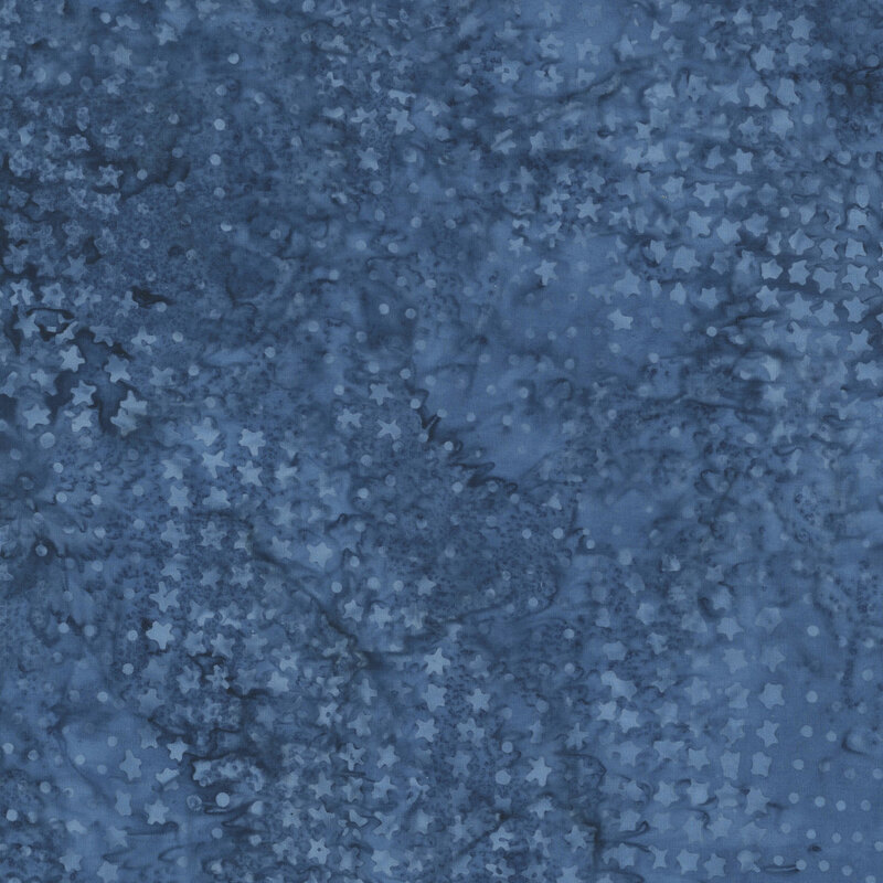Mottled blue fabric with a pattern of scattered dots and stars.