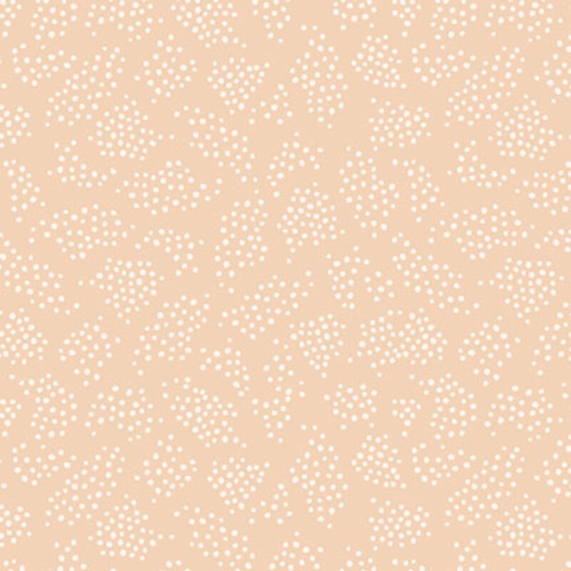 Beige fabric features patches of scattered cream dots.