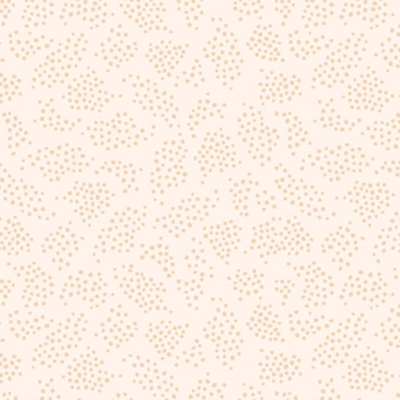 Cream fabric with patches of scattered tan dots.