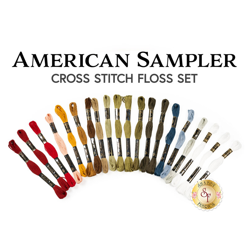 American Sampler cross stitch floss set with various colored threads displayed in neat rows.