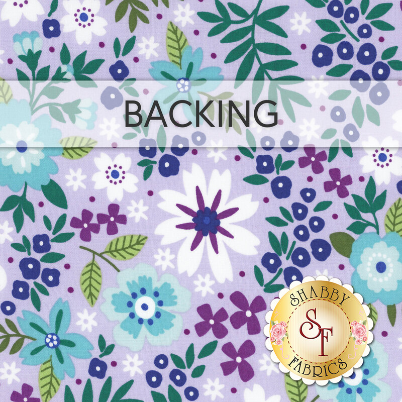 A swatch of lavender fabric with cool toned florals. A banner at the top reads "backing" and a gold "Shabby Fabrics" logo sits in the bottom right corner. 