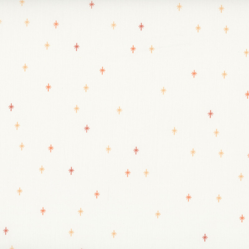 This cream fabric features a peach design of scattered sparkles, adding a playful and magical touch to your projects.