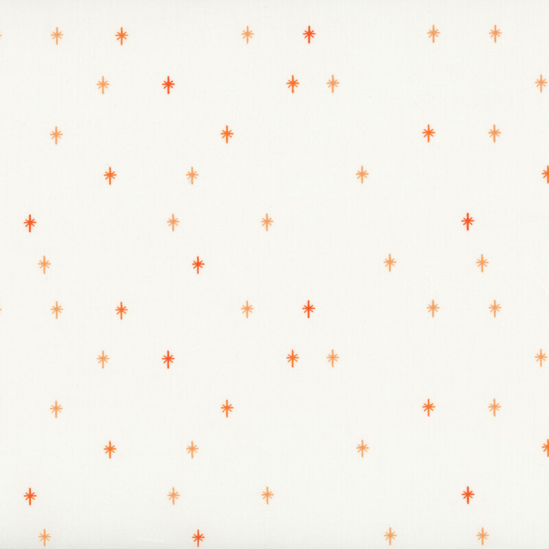 This cream fabric features an orange design of scattered sparkles, adding a playful and magical touch to your projects.