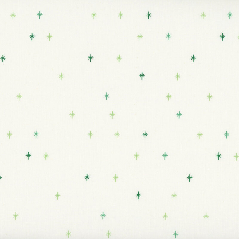 This cream fabric features a dark aqua green design of scattered sparkles, adding a playful and magical touch to your projects.