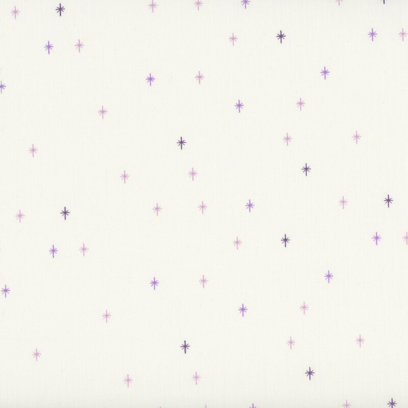 This cream fabric features a purple design of scattered sparkles, adding a playful and magical touch to your projects.