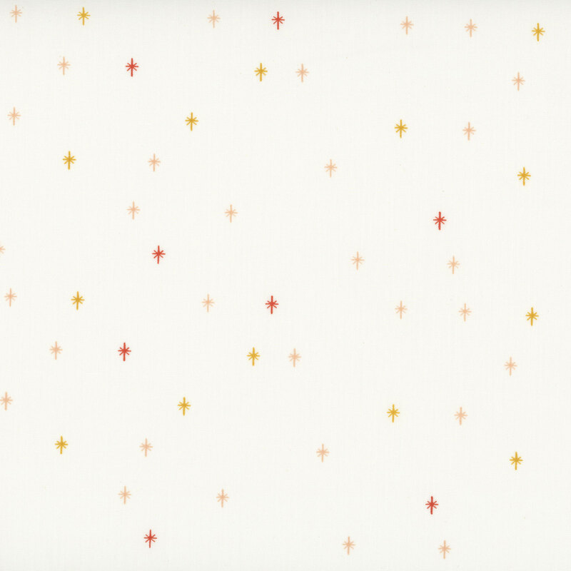 This cream fabric features a spiced design of scattered sparkles, adding a playful and magical touch to your projects.