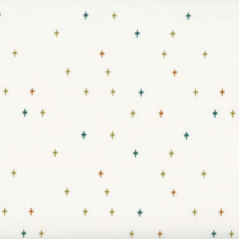 This cream fabric features a muted orange, olive green, and teal design of scattered sparkles, adding a playful and magical touch to your projects.