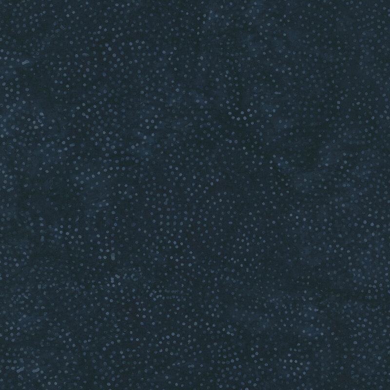 Mottled navy blue batik fabric with a circular pattern of scattered dots.